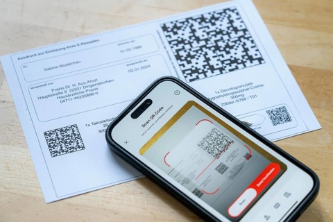 Symbolic image of an e-prescription, prescription issued by a doctor, with QR code, is scanned