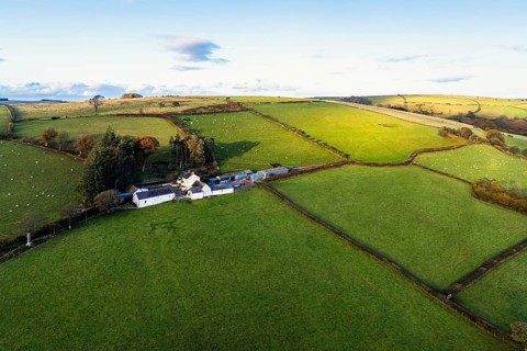 Farms over Trecastle from a drone at sunset, Brecon Beacons National Park, Powys, Wales, England,