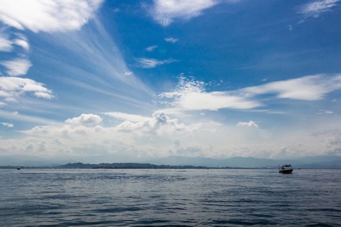 Blue sea and blue sky with clouds