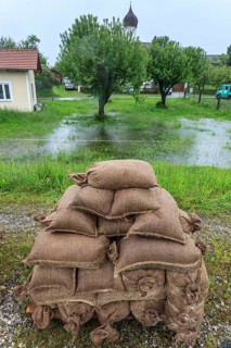 Sandbags, continuous rain, high water, flooding, town, houses, Whitsun floods 2013, climate change,