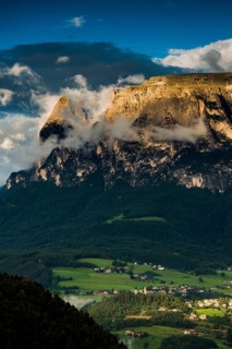 Sunset and mountain peaks in the clouds, Catinaccio, Dolomites, South Tyrol, Trentino-Alto Adige,