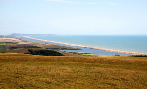 View west along Chesil beach tombolo from Abbotsbury to the Isle Portland, Dorset, England, UK