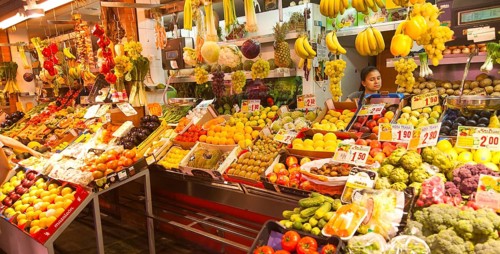 Fruit and vegetable stall in historic market building in Triana, Seville, Spain, Europe