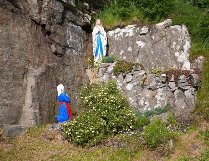Madonna statue in rocky grotto at Northbay, Barra, Outer Hebrides, Scotland, UK