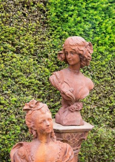 Rusted metal cast iron bust statues female figures, The Walled garden plant nursery, Benhall,