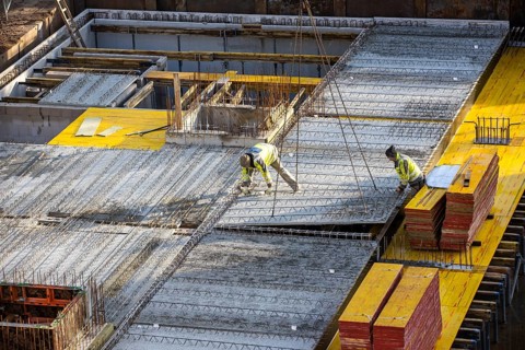 Construction site, installation of semi-precast floor slabs, which are then filled with in-situ