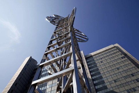 Sculpture by Nicolas Schöffer entitled Chronos 15, light-kinetic tower in front of the Stadthaus,