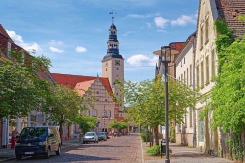 Residential and commercial buildings in Rudolf-Breitscheid-Straße, paved with cobblestones, in the