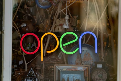 Open lettering in the window of a souvenir shop, Riga, Latvia, Europe