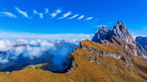 The Sas Rigais and Furchetta peaks of the Odle Group, drone shot, Val Gardena, Dolomites,