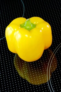 Yellow pepper on glass plate, Stillife, Studio
