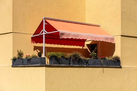 Yellow balcony in Hermann-Beims-Siedlung, built in the Neues Bauen style from 1925 to 1932,