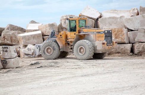 Heavy machinery in a working quarry, Isle of Portland, Dorset, England, United Kingdom, Europe