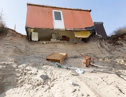 March 2018, Clifftop property collapsing due to coastal erosion after recent storm force winds,