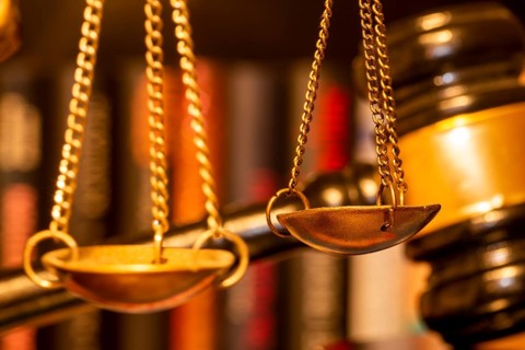 Symbolic image of justice, jurisdiction, court judgement: close-up of the scales of Justitia, a