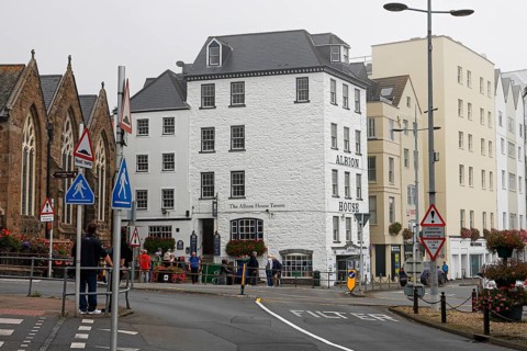 Town view of St. Peter Port with historic pub Albion House Tavern, St. Peter Port, Channel Island