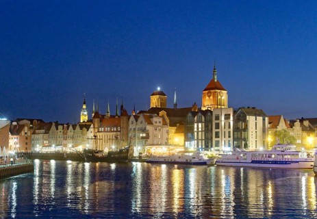 The harbour district on the Motlawa river, Motlawa, in the city centre of Gdansk, illuminated in