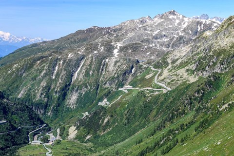 View down the Rhône valley to the village of Gletsch at the bottom left at the back right steep