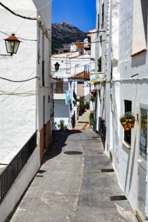 Typical white village Casares, houses, narrow alley on a hill, Route of the white villages, Malaga,
