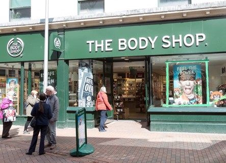 The Body Shop shoppers walking in street, Tavern Street, Ipswich, Suffolk, England, UK