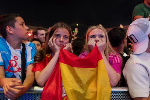 Two female fans of the Spanish team fear after the English equaliser at the Adidas fan zone at the