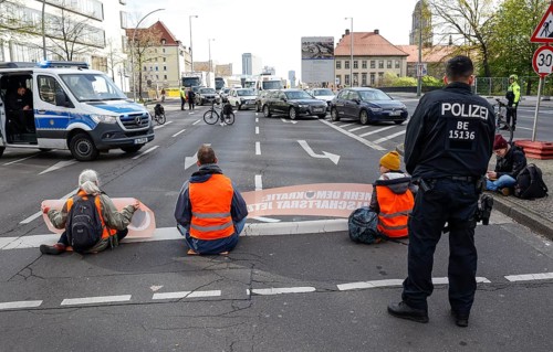 Activists of the Last Generation block a street, Berlin, 24 04 2023