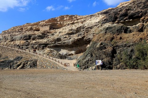 Start of cliff top coastal path on beach at the coastal village of Ajuy, Fuerteventura, Canary