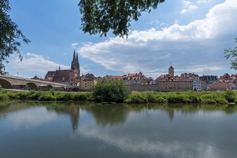 City view with St Peter's Cathedral and Stone Bridge, in front an arm of the Danube, Regensburg,