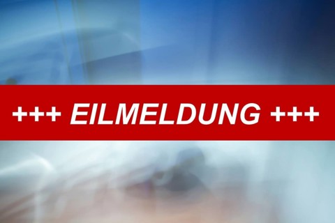Symbolic image: The word breaking news on an abstract background