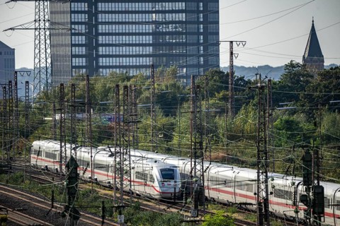 Railway tracks in front of Essen main station, ICE 2 train and ICE 4, in front, on the tracks,
