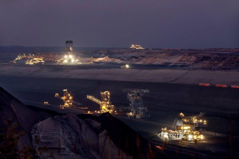 Lignite excavators extract coal in the Welzow open-cast mine, operated by LEAG. The lignite is