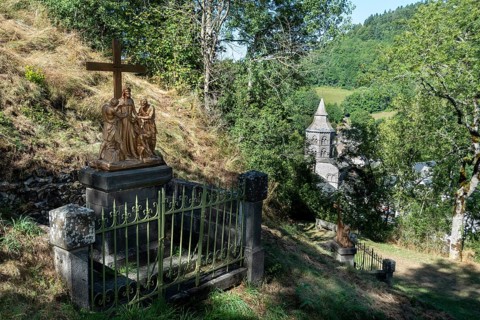 Orcival in Auvergne Volcanoes Regional Natural Park, Statues of Christ's Way of the Cross. Puy de
