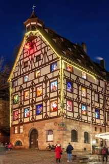 Pilatushaus, built in 1489, a historic town house with an Advent calendar on 18 December 2024 at