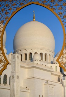 View through a window onto a dome of the Sheikh Zayed Mosque, Abu Dhabi City, Emirate of Abu Dhabi,