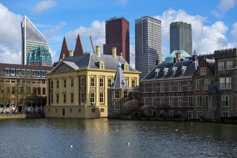 Museum Mauritshuis at the Hofvijver, Hofweiher, in the background the modern skyline, The Hague,