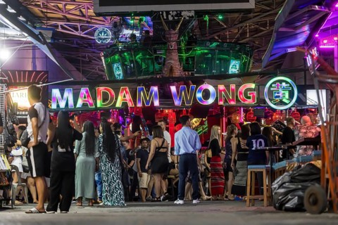 Crowds of people on Bangla Street in the evening. Nightlife on Bangla Walking Street with go-go
