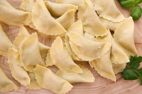 Swabian cuisine, preparation of salmon ravioli, stuffed raw pasta patties, fish dish, salmon in