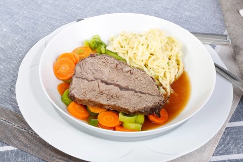 Swabian cuisine, roast beef, roast ox, herb spaetzle, meat dish, gravy, carrot vegetables, leek,