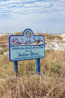 Sign indicates public access to the white sand beach of Indian Shores, Florida, USA, North America