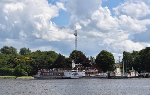 Rescue helicopter near paddle steamer Freya in the Kiel Canal, Kiel Canal, Schleswig-Holstein,