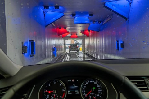 Car in an automatic car wash, car wash tunnel, drying