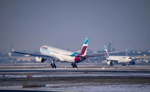Discover Airbus A330-300 on landing approach and on the taxiway, at Frankfurt FRA Airport, Fraport,