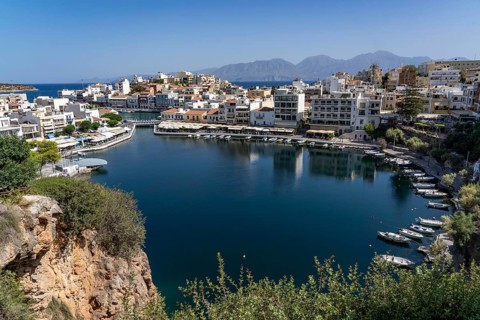 The village of Agios Nikolaos, in the eastern part of Crete, view over Lake Voulismeni, connected