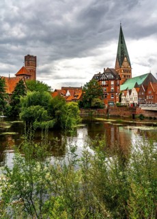 The water tower, river Ilmenau, Ratsmühle, St.Johanniskirche, city centre, old town of Lüneburg,