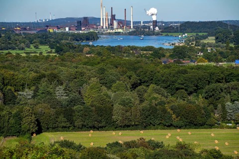 View across the Rhine to the Thyssenkrupp Steel steelworks in Duisburg-Beeckerwerth, blast