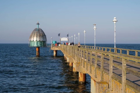 Tourists on the Vineta Bridge, pier with diving gondola, Zinnowitz, Usedom Island, Baltic Sea,