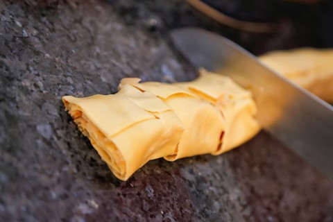 Swabian cuisine, preparation of cabbage fritters, Swabian flour sacks, stuffed pasta pancakes with