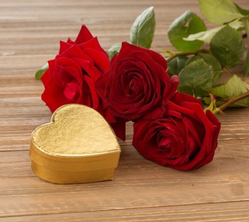 Roses as a gift and surprise for a celebration. Symbol photo for birthday, Mother's Day, love,