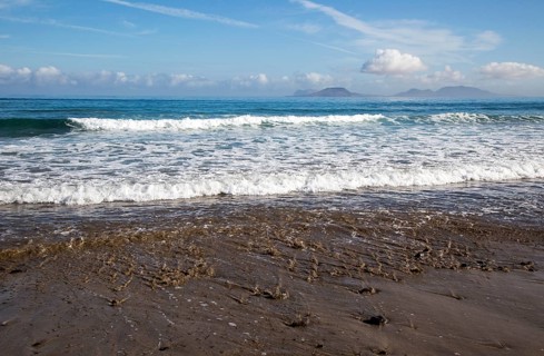 Atlantic Ocean coast beach and waves, Caleta de Famara, Lanzarote, Canary islands, Spain, Europe