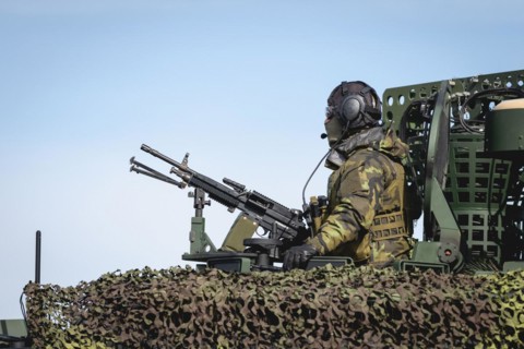 A Czech soldier occupies the hatch of a protected vehicle as part of the military exercise